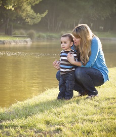 Mom and toddler at lake.