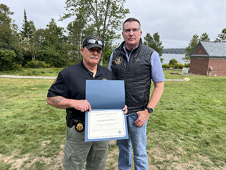 DMR Manager of the Year, Marine Patrol Sergeant Mark Murry with Commissioner Keliher