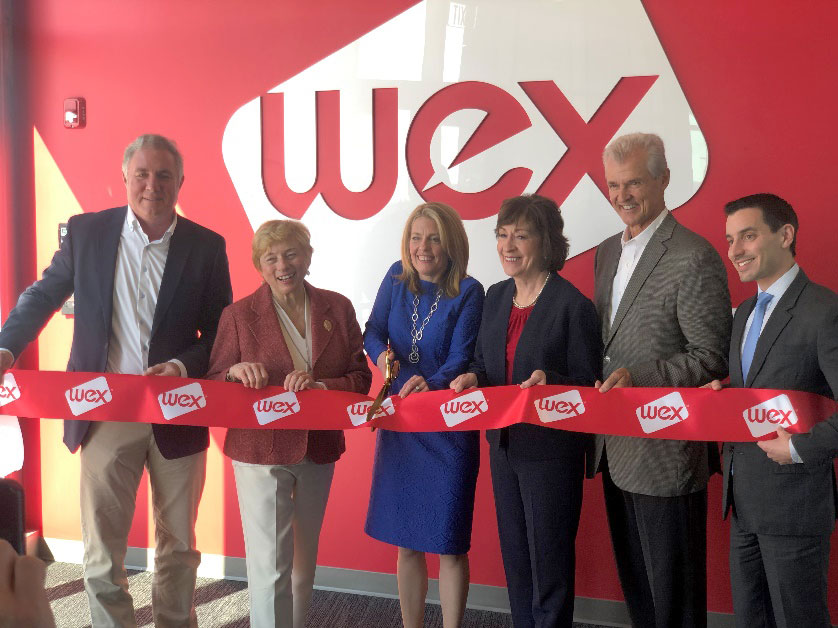 Governor Mills cutting the ribbon at a WEX opening