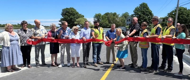 Governor Mills with cutting a ribbon for the new causeway improvements in Kennebunkport